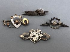 Collection of four silver (one silver and Gold) hallmarked Sweetheart brooches (4)