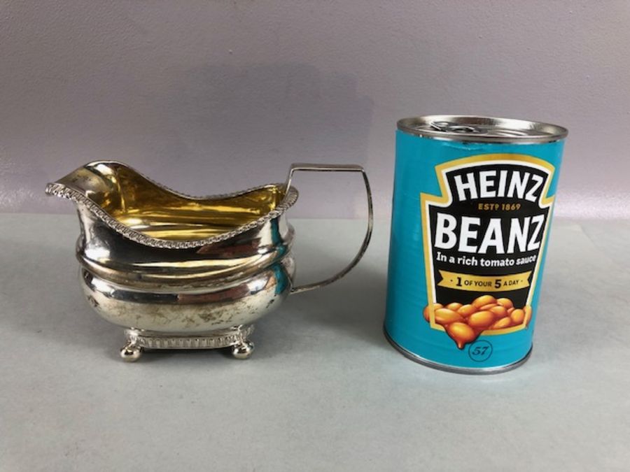 Silver Hallmarked Georgian milk jug on four bun feet with gold gilt interior hallmarked for Exeter - Image 10 of 10