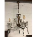 Gilt metal and glass three arm chandelier