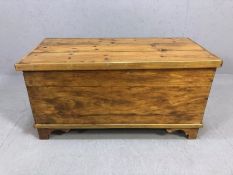 Small pine blanket box with metal fittings and storage compartment internally, approx 91cm x 47cm