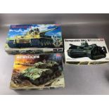 Three ACADEMY unassembled 1:35 scale model tanks: Sturmgeschutz, Achilles, Tiger-I