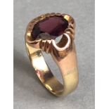 9ct Gold ring set with a faceted garnet stone size 'L' and approx 2.8g