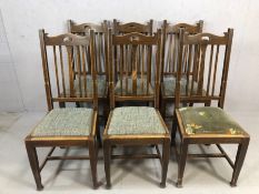 Set of six Arts and Crafts dining chairs with upholstered seats, height at back approx 107cm
