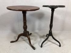 Two antique wine tables both on tripod legs