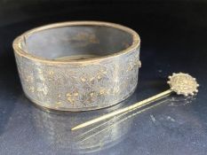 Hallmarked silver bangle and a silver coloured hat pin