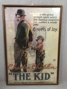 Framed vintage cinema advertising poster for Charles Chaplin in ''The Kid'', approx 96cm x 65cm
