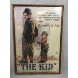 Framed vintage cinema advertising poster for Charles Chaplin in ''The Kid'', approx 96cm x 65cm