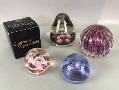 Collection of four Caithness paperweights one boxed