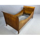 Antique single sleigh bed with inlaid detailing