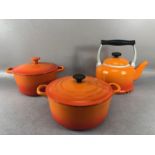 Collection of enamel cookware to include 'Volcanic' coloured Le Creuset kettle, and a lidded