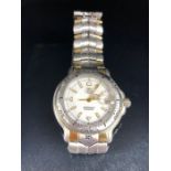 TAG HEUER - 6000 Series quartz watch. Reference WH1151-k1. White dial with luminous hour markers,