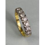 18ct yellow gold Diamond ring set with seven diamonds size 'R' and total weight approx 6.1g