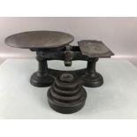 Set of vintage cast iron scales with copper pan and set of weights