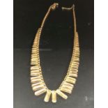 9ct Gold necklace with graduated fringe and safety chain approx 39cm long and 6.1g