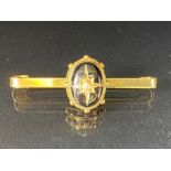 Victorian Mourning Brooch on 9ct Gold Bar set with seed Pearl in starburst design on black enamel