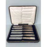 Set of six boxed silver handled butter knives hallmarked for Sheffield by maker Harrison