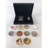 Collection of collectable coins to include boxed BATTLE OF THE SOMME, Poppy Crown, Trade Dollar