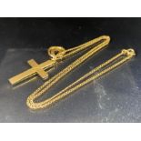 9ct Gold chain with 9ct Gold Cross and 9ct horseshoe pendant (total weight approx 4.6g)