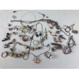 A Quantity of silver (925) Jewellery to include Bracelet ,Earrings, lucky charms, and rings ,all