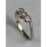 9ct White Gold three stone Diamond crossover ring size approx 'K'
