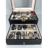 Collection of 20 fashion watches of various makes and designs in a two tier presentation case (all