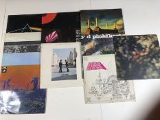 11 PINK FLOYD LPs/12" including: Dark Side Of The Moon, Recorded Live At The Rainbow 1972, Atom