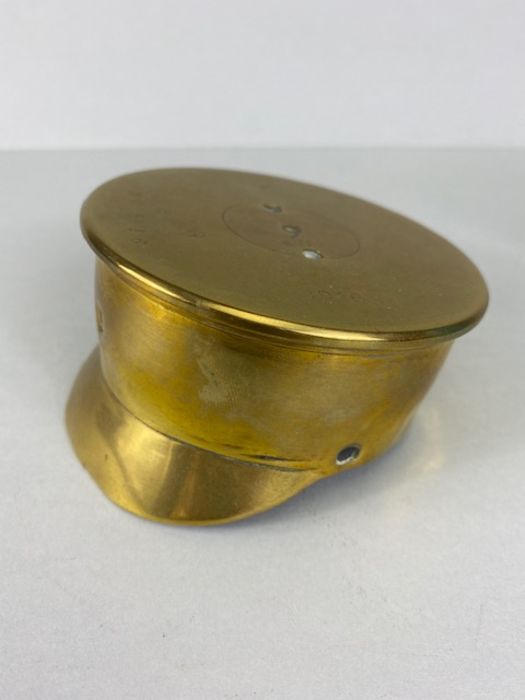 Military interest, WW1 trench art cap, made from a brass shell case dated 1916.