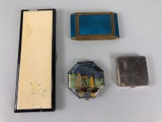 Three vintage compacts and a black Bakelite cigar case