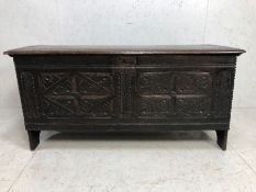 Antique coffer , Antique dark wood coffer chest with stylised carved decoration to front and top,