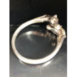 HERMES: Twin horse head silver coloured bangle marked Hermes Made in France