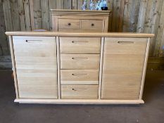 Contemporary modern blonde oak sideboard with flight of four drawers flanged by two cupboards approx