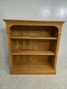 Pine floor standing bookcase with three shelves, approx 85cm x 28cm x 93cm tall