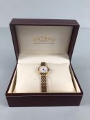 Rotary 9ct Gold wristwatch with 9ct Gold strap, circular white face with baton markers in original