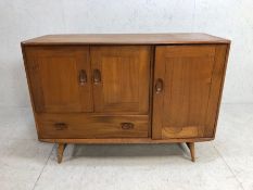 ERCOL Windsor sideboard on tapering splayed legs, with two cupboards and drawer and pull-out cutlery
