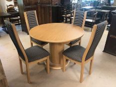 Round extending table, approx 151cm fully extended x 110cm wide x 78cm high. When collapsed approx