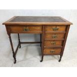 Antique Desk , Antique light wood ladies desk on casters with 5 draws, brass handles, leather insert