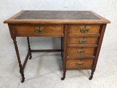 Antique Desk , Antique light wood ladies desk on casters with 5 draws, brass handles, leather insert