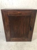 Dark stained pine cupboard with Bakerlite handle, interior with two shelves