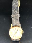 9ct Gold watch by Tissot
