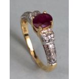 14ct Gold cushion cut Ruby and Diamond encrusted ring size 'O'