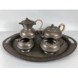 Arts & crafts pewter, A "Unity" ware English pewter tea service in the Arts & crafts style,