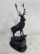 Statue of a Stag, large metal statue of a stag stood on rocks mounted on a marbel base with