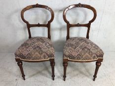 Pair of fabric seated balloon back bedroom chairs with carved detailing