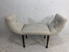 Sheraton revival window seat with tapering legs and spayed feet with light coloured upholtery and