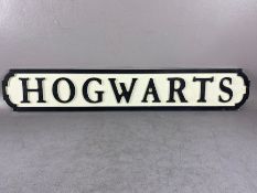 Modern wooden sign, Harry Potter interest, 'HOGWARTS', in the form of a cast iron road sign,