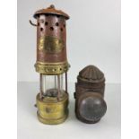 Miners Lamp, A Miners lamp by Thomas & Williams Ltd, Aberdare, an antique hand held tin candle