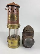 Miners Lamp, A Miners lamp by Thomas & Williams Ltd, Aberdare, an antique hand held tin candle