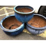 Three large blue glazed circular garden pots