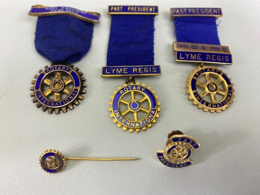 Rotary Club medals, 3 Rotary club medals 0ne of which is hall marked silver with gilt finish, and