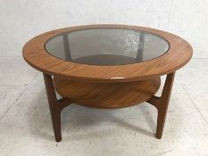 Schreiber circular coffee table with smoked glass inset top and shelf under, approx 84cm in diameter